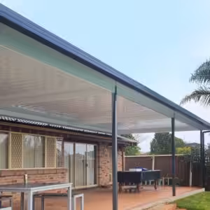 DIY attached flyover flat roof patio with table and furniture.