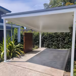 DIY freestanding flat roof carport with garden and privacy screen