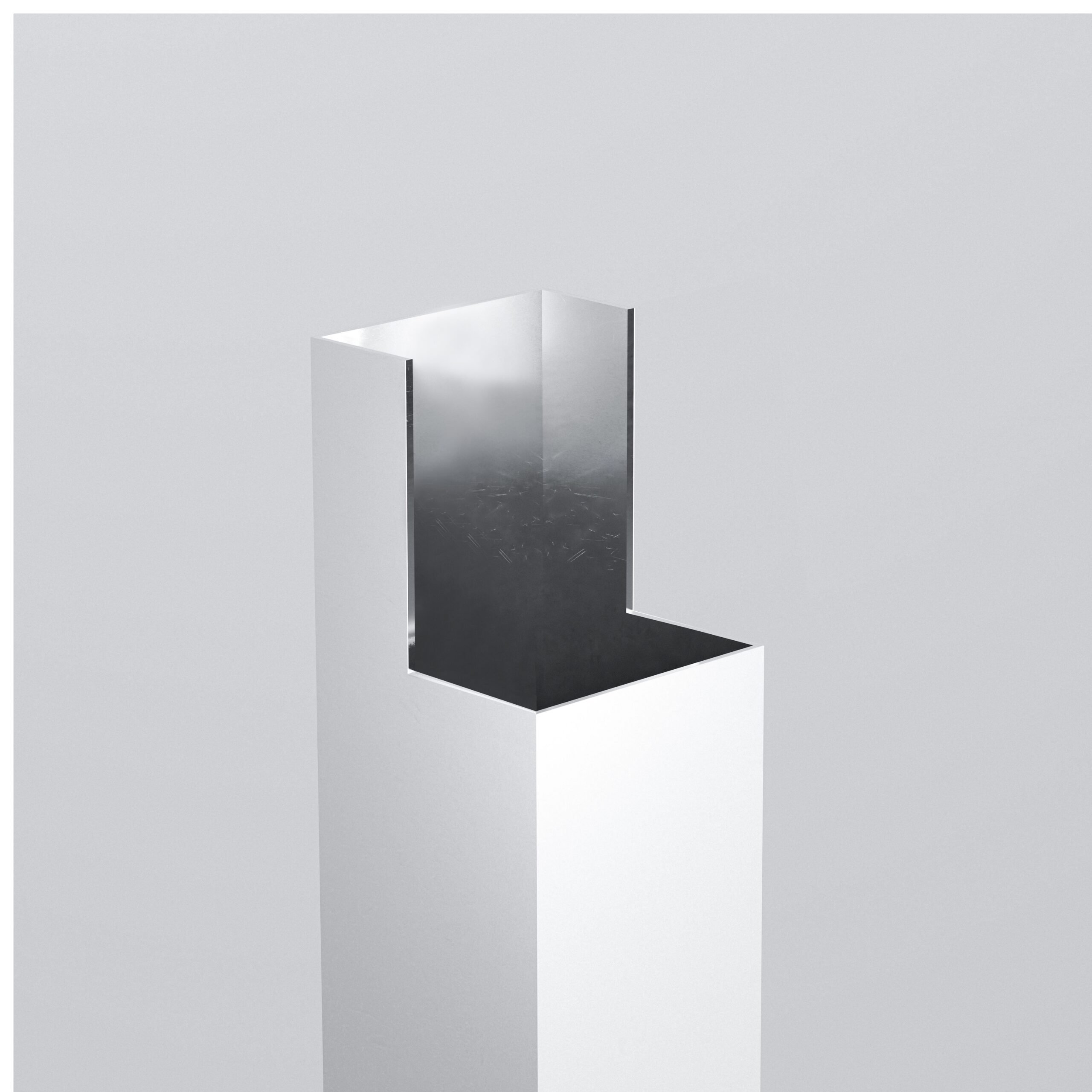 Minimalist sculpture with reflective surface.