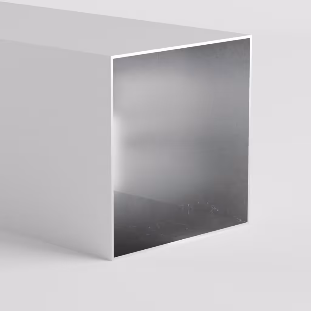 Corner view of a metallic rectangular object.