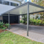 Modern house with attached diy freestanding flat roof carport