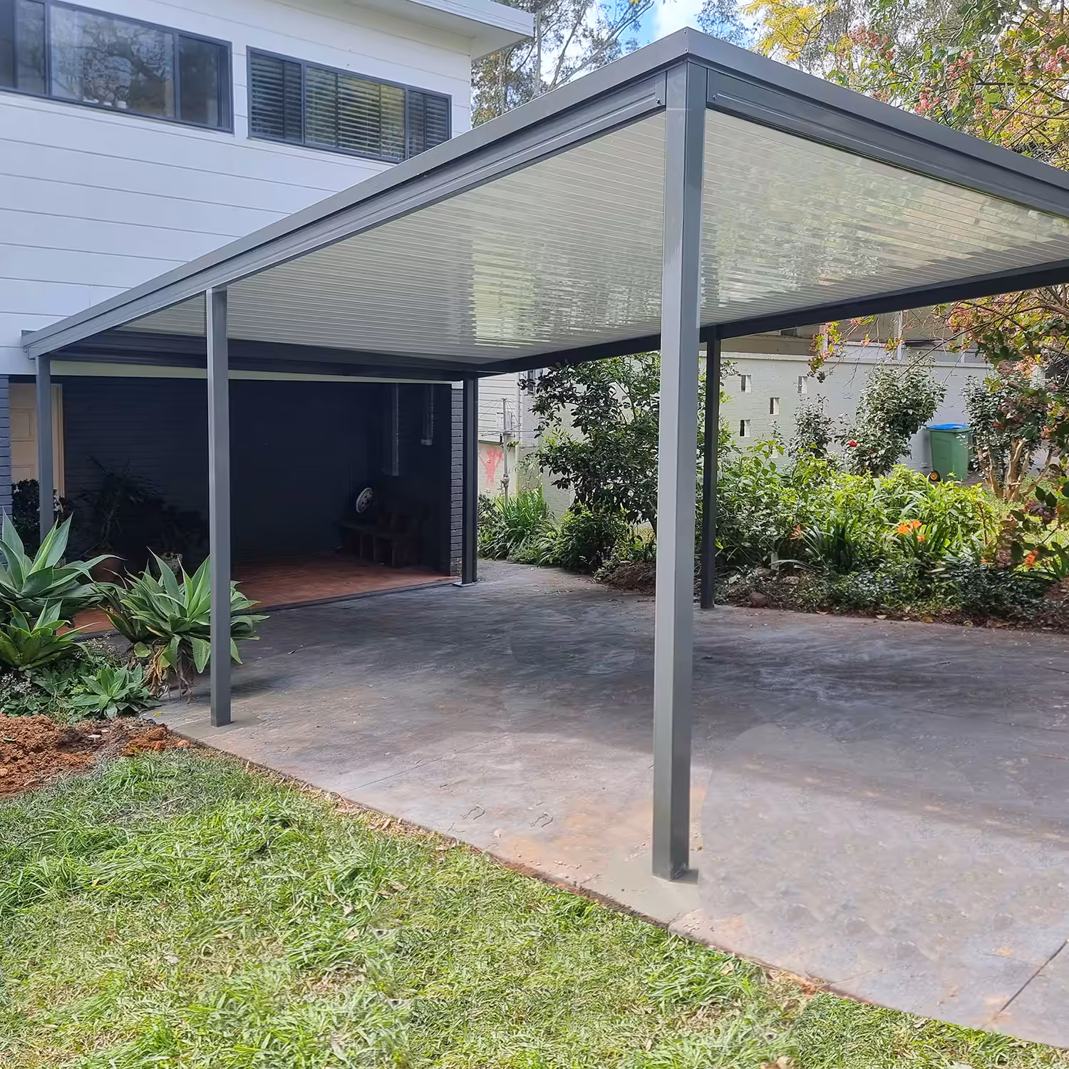 Modern house with attached diy freestanding flat roof carport