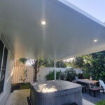 DIY attached flat roof pergola/patio with hot tub