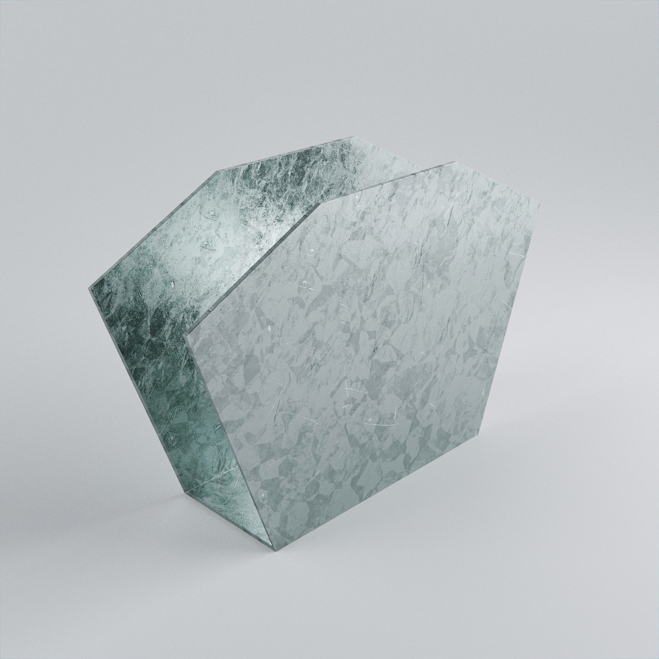 Geometric glass sculpture with textured surface.
